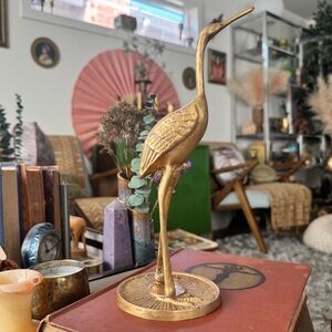 Vintage brass crane figure